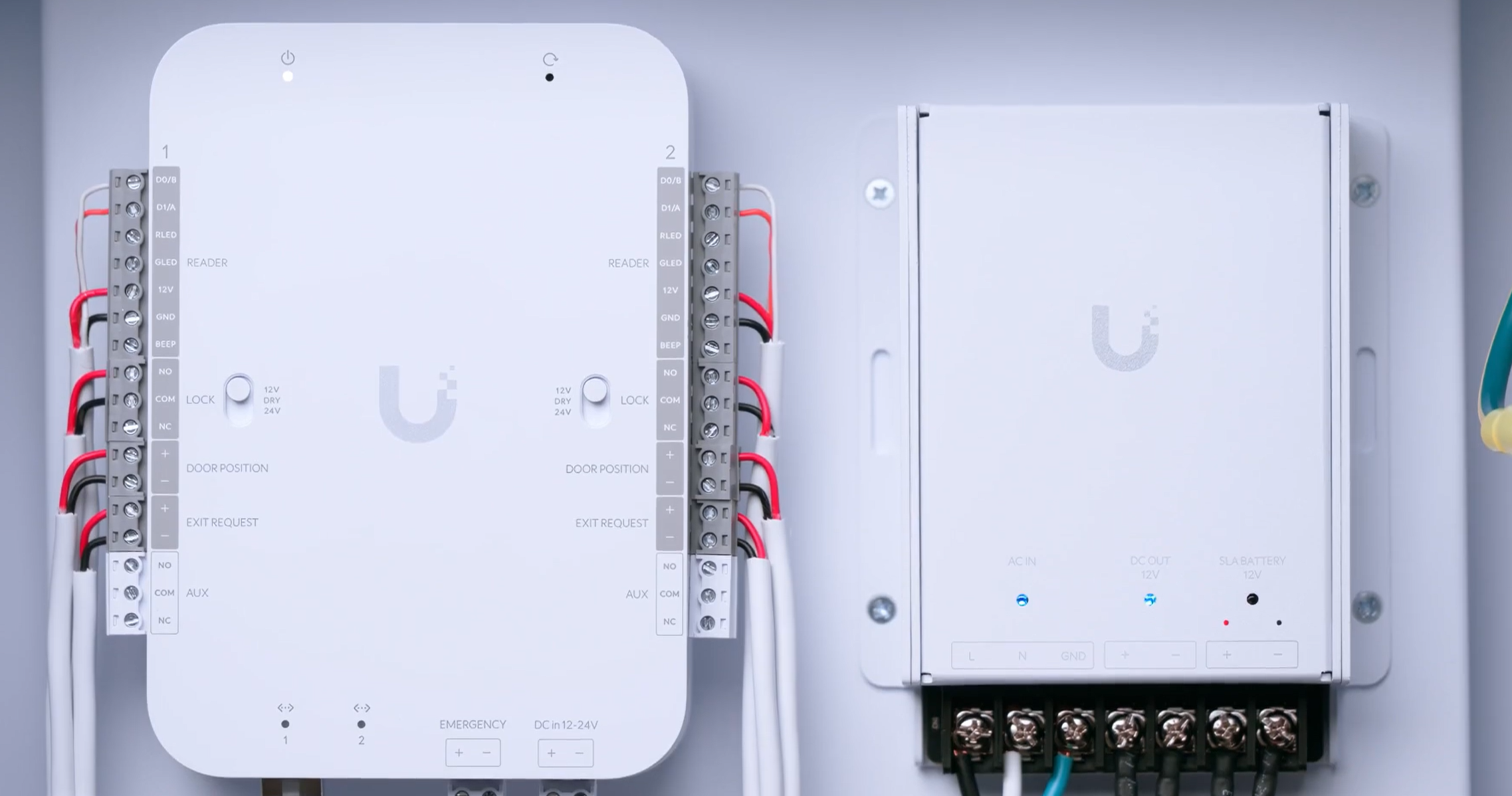 UniFi door-access controller and power supply with connected wiring