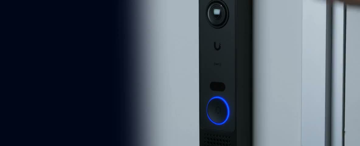 UniFi entry reader mounted beside a door